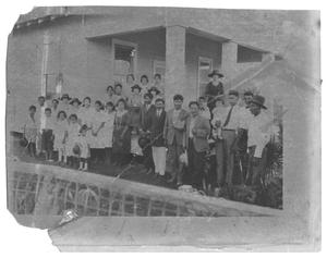 [Group Portrait on the Back Porch of a Building]