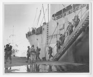 Primary view of object titled '[Soldiers Filing Off Ship for Bayonet Training]'.