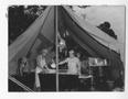Photograph: [Men Preparing Food Under A Tent]