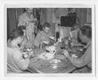 Photograph: [Soldiers Eating Dinner]