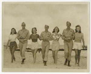 [Soldiers and Women Walking on the Beach]