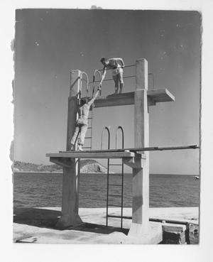 Primary view of object titled '[Men on Diving Platform]'.