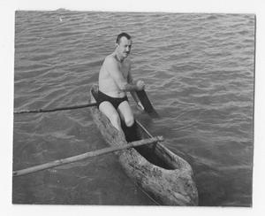 [Man in Canoe]