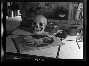 [Skull with a Magazine]