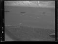 Photograph: [Negative Aerial View of Ships on the Water, #1]