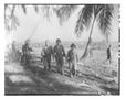 Photograph: [Negative of Soldiers in Uniform on the Beach]
