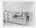 Photograph: [Soldiers and Vehicle on Beach]