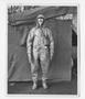 Photograph: [Soldier in Hazmat Suit and Gas Mask]