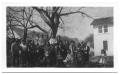 Primary view of [Group of Hispanic People Crowded Under a Crooked Tree]