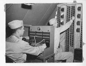 [Two U.S. Navy Radiomen]