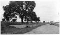 Thumbnail image of item number 1 in: '[Photograph of Sitting Area Next to Road]'.