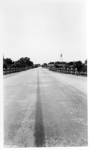 [Photograph of a Road Leading Into Town]