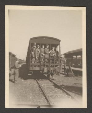 [U.S. Army Men on Train Caboose]