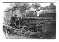 Photograph: [Henrietta Outhouse wagon]