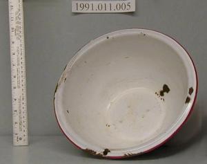 Primary view of object titled 'Red and white enamel ware mixing bowl.'.