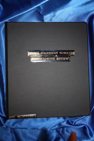 Primary view of object titled '[Image of Detective James McSpadden's Investigative Review notebook on the Amber Hagerman Homicide, view 1]'.