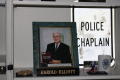 Thumbnail image of item number 1 in: '[Image of items recognizing Chaplain Harold Elliott, founder of the Arlington Police Museum]'.