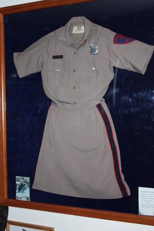[Image of a case displaying the uniform worn by Martha Willbanks, Arlington's first female officer]