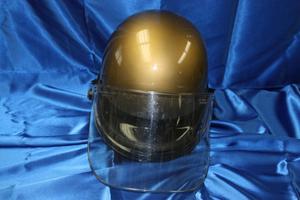 [Image of an APD helmet with face shield]