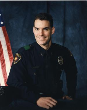 Primary view of object titled '[Arlington Police Officer Craig M. Hanking, portrait]'.