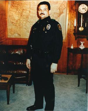 [Arlington Police Officer Terry L. Lewis in uniform]