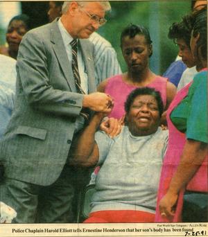 [Arlington Police Chaplain Harold Elliott comforting Ernestine Henderson, newspaper clipping, 1991]