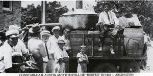 Primary view of object titled '[Arlington Constable A. B. Austin with moonshine still he "busted" in 1932]'.