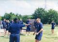Primary view of [APD training. Dwane Kelley spraying a trainee with pepper spray]