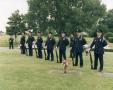 Photograph: [APD Honor Guard Rifle team at a memorial service]