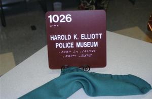 [The Harold K. Elliott Police Museum official name plaque, 2004]