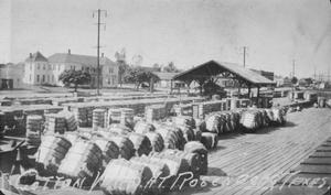 [Cotton bales at Rosenberg, TX train depot]