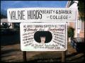 Photograph: [Hurd's Barber and Beauty College Sign]