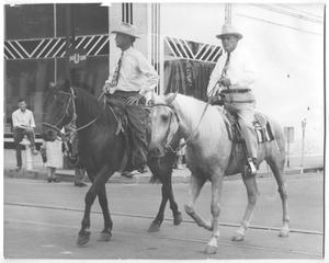 Photograph of Sam Rayburn and Another Man Riding Horseback in a Parade