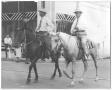 Primary view of Photograph of Sam Rayburn and Another Man Riding Horseback in a Parade