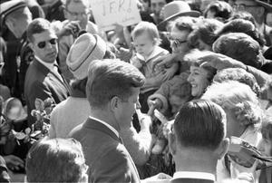 [The Kennedys greeting the crowd at Love Field]