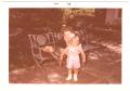 Thumbnail image of item number 1 in: '[Lillie Abercrombie with toddler on patio bench]'.