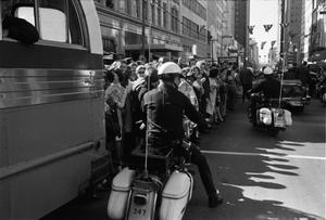 Primary view of object titled '[Motorcycles in the presidential motorcade on Main Street]'.
