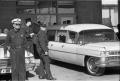 Photograph: [Hearse at Parkland Hospital with casket for President Kennedy]