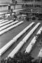 Thumbnail image of item number 1 in: '[Banquet tables being set up at the Dallas Trade Mart]'.