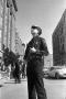Primary view of [A Dallas Police officer outside the Texas School Book Depository]