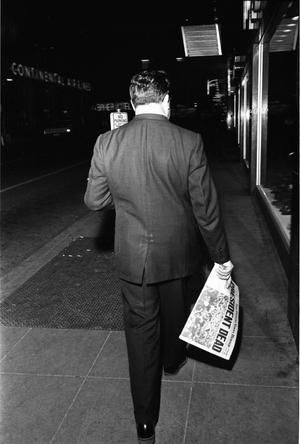 [Unidentified man in downtown Dallas on the evening of November 22, 1963]