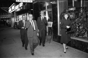 [Pedestrians in downtown Dallas the evening of November 22, 1963]