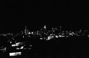 [The Dallas skyline on the night of November 22, 1963]