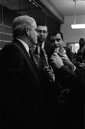 Primary view of object titled '[District Attorney Henry Wade's press conference at the Dallas Police Department]'.