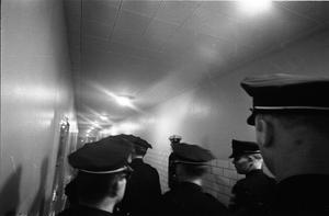 [Dallas Police officers in a hallway at Parkland Hospital]