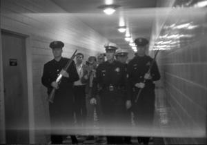 [Dallas Police officers in the hallway at Parkland Hospital]