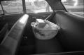 Photograph: [Basket full of items in a car parked at Parkland Hospital]