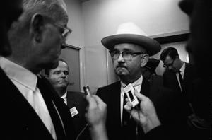 Primary view of object titled '[Tom Howard speaking to reporters at the Dallas Police Department]'.