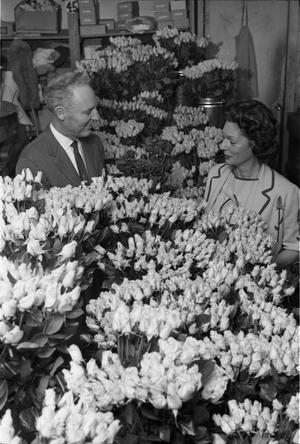 Primary view of object titled '[Dallas florists with roses to be used to decorate the Dallas Trade Mart]'.