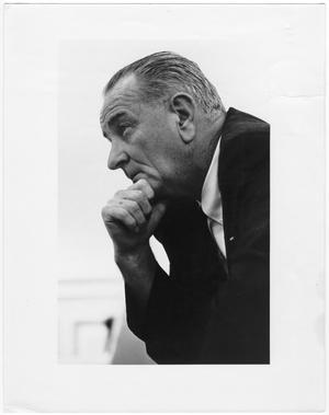 [President Lyndon Baines Johnson in thinker pose]
